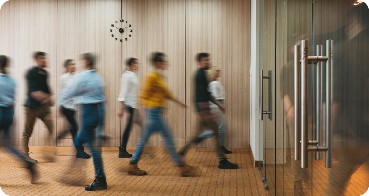 a group of people standing in a room