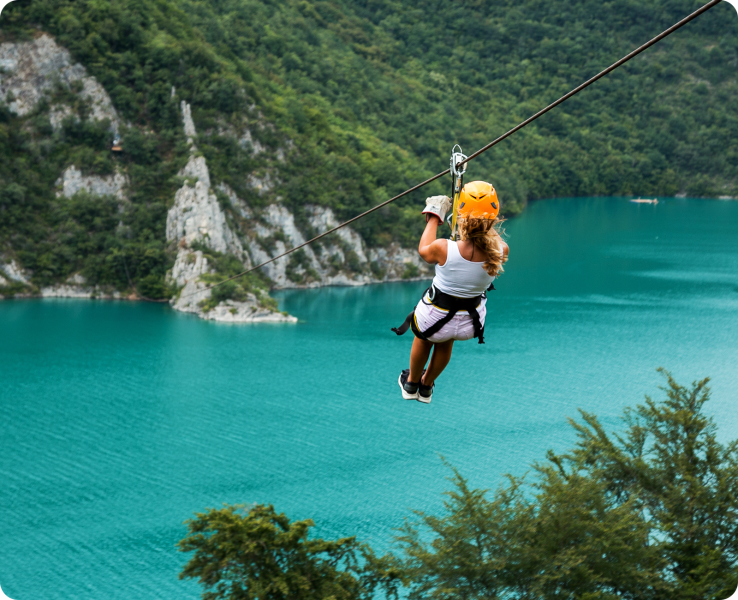 a man riding water skis on top of a mountain